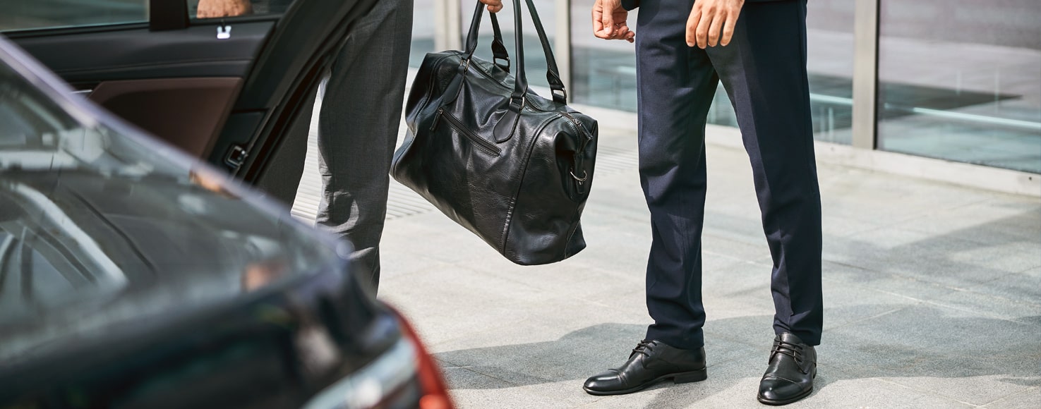 chauffeur providing Newark airport car service at EWR Terminal A